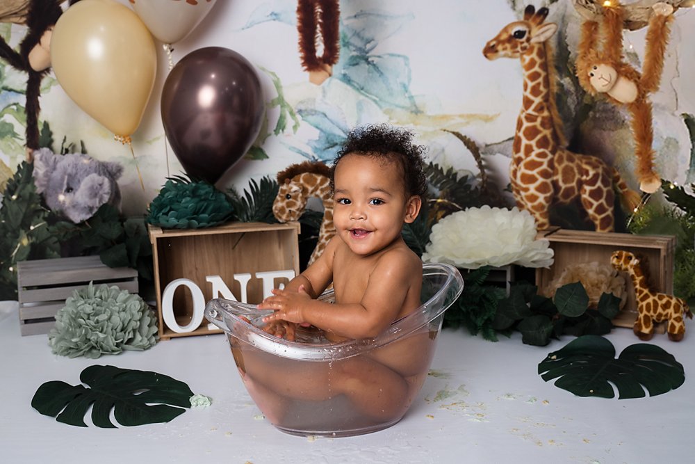Little boy splashing in tub